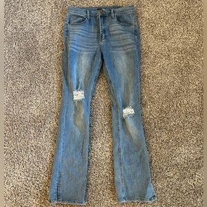 Fashion Nova light wash ripped fit & flare style jeans! Size 15